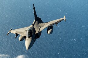 Swedish Air Force Gripen flies over Greece during a training sortie