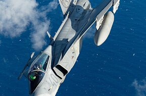 Hungarian Air Force Gripen flies over Greece during a training sortie