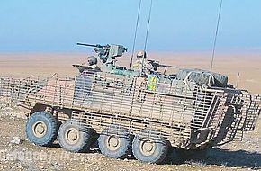 An Australian ASLAV in Iraq fitted with new "bar armour" to stop