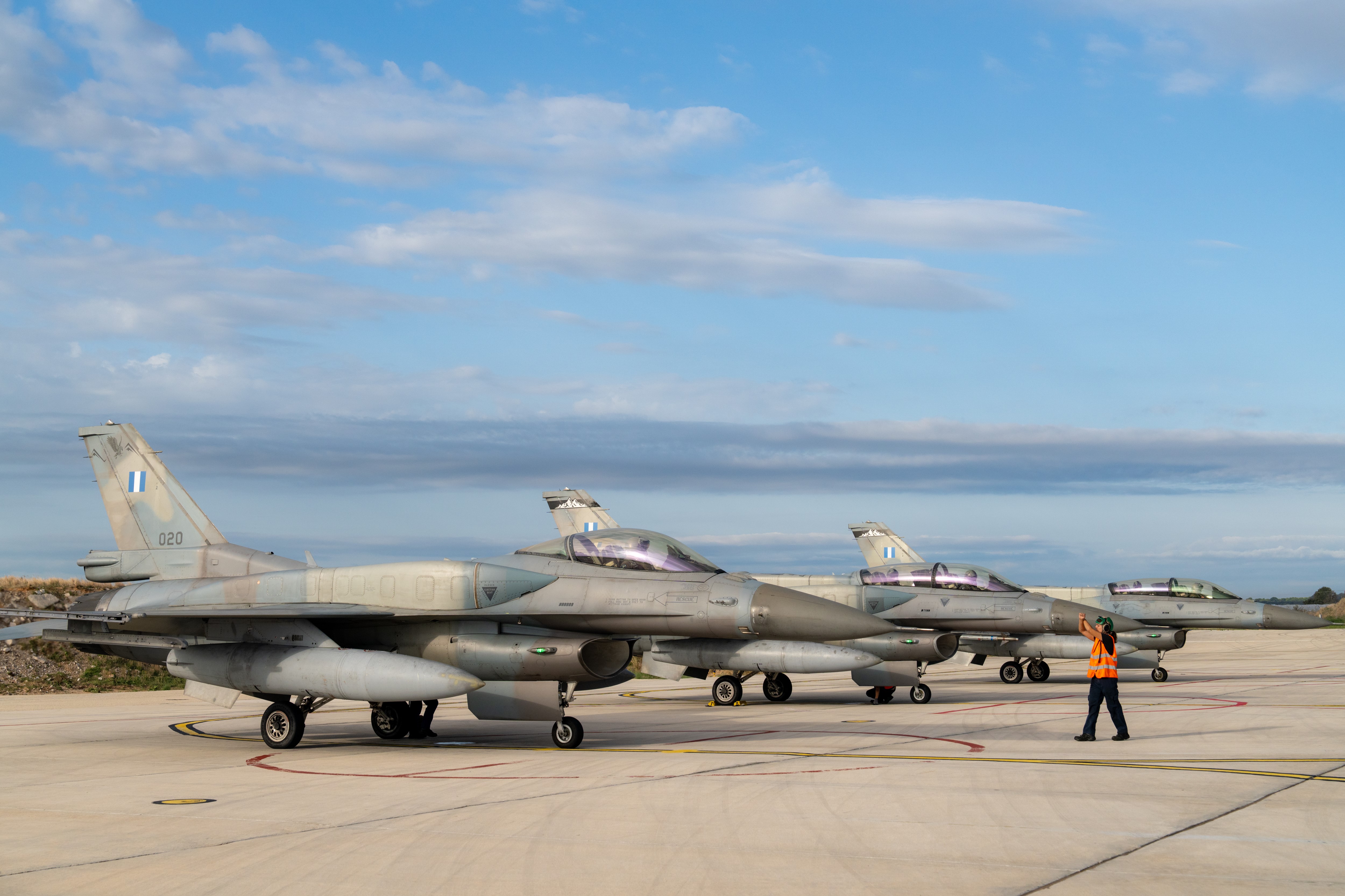 A line up of Hellenic Republic Air Force F-16s prepare for take-off